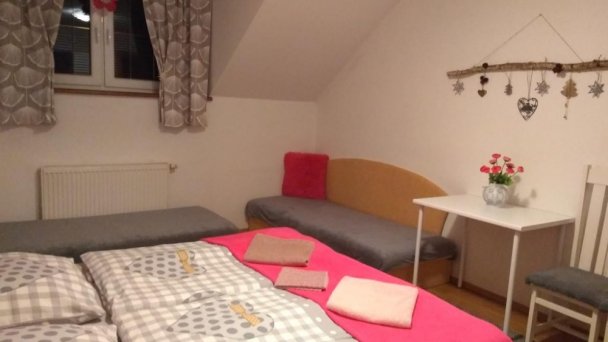 Spálňa v apartmáne na poschodí