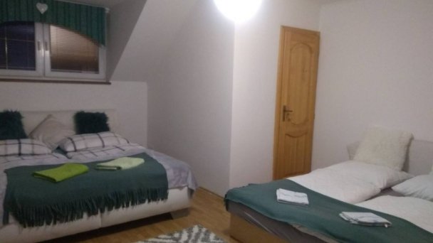 Spálňa v apartmáne na poschodí